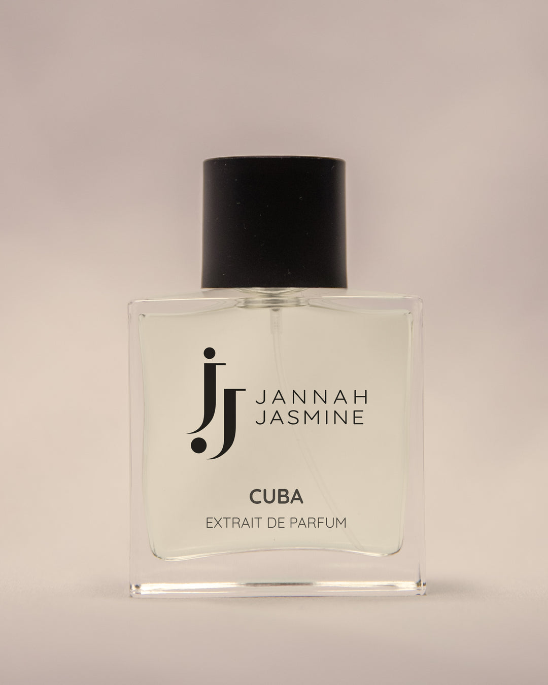 Jannah Jasmine Cuba Extrait de Parfum, Unisex fragrance, bottle on a beige background